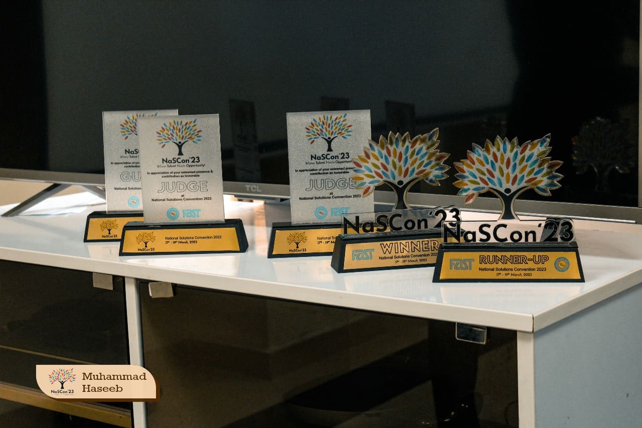 Award ceremony — winners receiving trophies from dignitaries